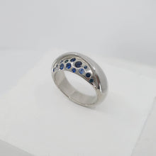 Load image into Gallery viewer, The Whenua Ring in solid sterling silver set with multi toned sapphires. Handcrafted NZ jewellery from Vaune Mason available at Mason &amp; Collins.
