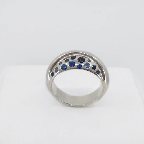 The Whenua Ring in solid sterling silver set with multi toned sapphires. Handcrafted NZ jewellery from Vaune Mason available at Mason & Collins.
