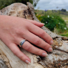 Load image into Gallery viewer, The Whenua Ring in solid sterling silver set with multi toned sapphires. Handcrafted NZ jewellery from Vaune Mason available at Mason &amp; Collins.
