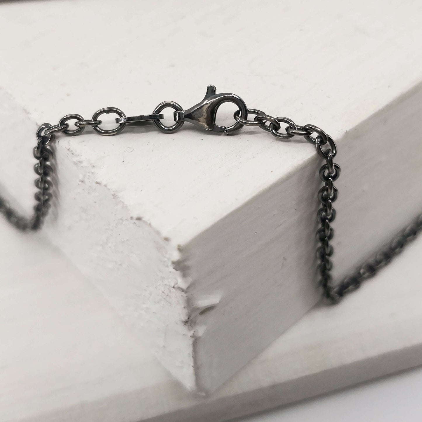 The Matariki Necklace catch in oxidised sterling silver by NZ jeweller Buster Collins.