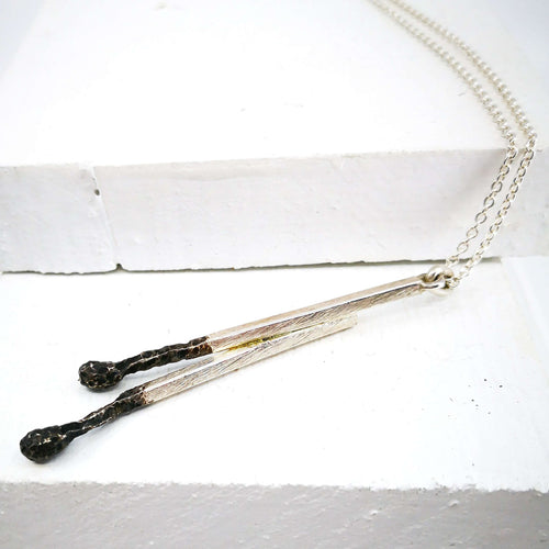 The Double Burnt Match pendant in solid sterling silver, by Dunedin based jeweller David McLeod. 