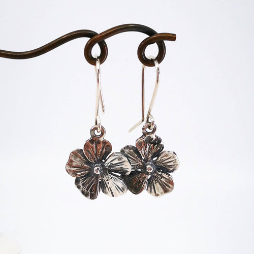 The Wild Rose earrings in silver. Handmade NZ jewellery by Rebecca Fargher. 