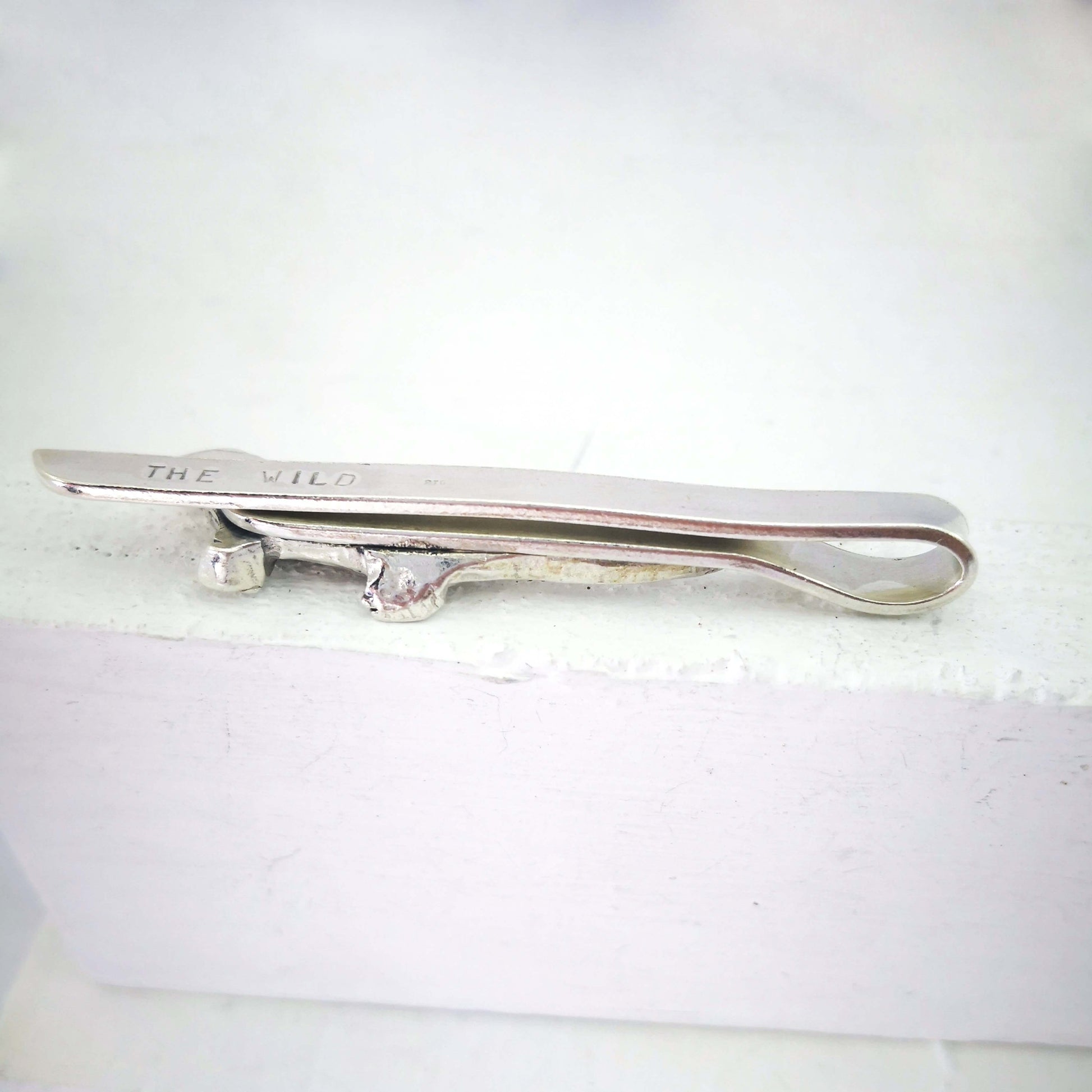 The Tuatara Tie Slide is hand crafted in sterling silver by The Wild Jewellery NZ.