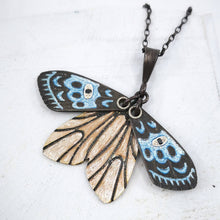 Load image into Gallery viewer, The beautiful Gypsy Moth pendant by Adele Stewart features moving wings coloured with glass enamels and set with tiny black diamonds.
