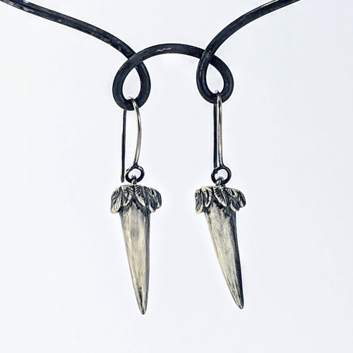 The Ruru Claw Earrings are handmade in solid sterling silver with an oxidised finish. From The Wild Jewellery NZ.