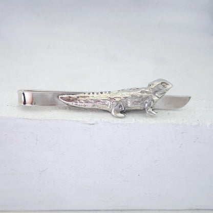 The Tuatara Tie Slide is hand crafted in sterling silver by The Wild Jewellery NZ.