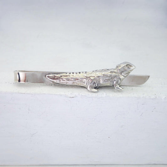 The Tuatara Tie Slide is hand crafted in sterling silver by The Wild Jewellery NZ.
