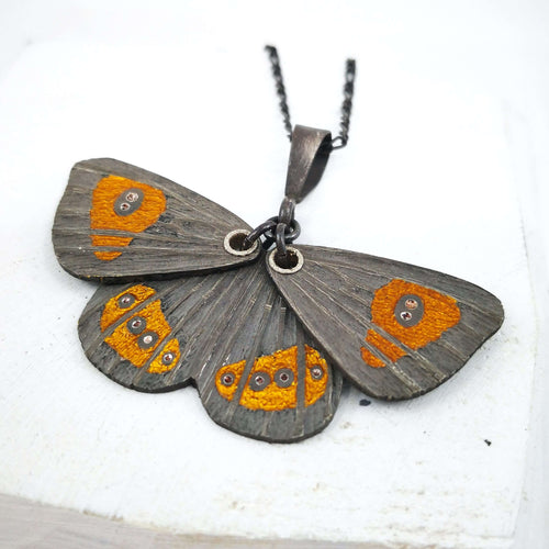 The Tussock Ringlet Butterfly pendant by NZ jeweller Adele Stewart. 