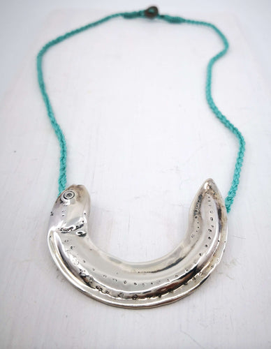 The Whitebait or Inanga Pendant is hand-crafted in solid sterling silver by NZ jeweller Vaune Mason. 