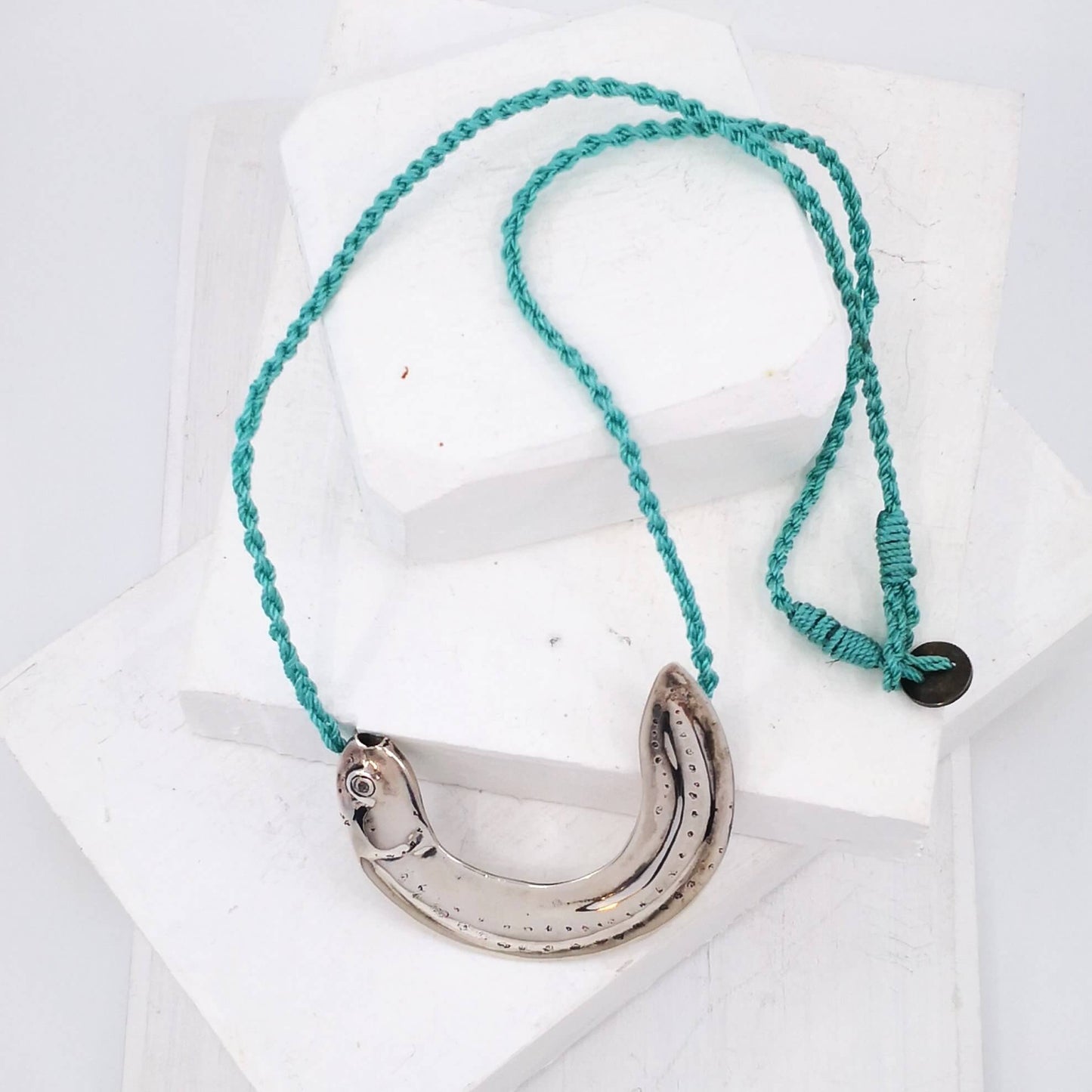 The Whitebait or Inanga Pendant is hand-crafted in solid sterling silver by NZ jeweller Vaune Mason.
