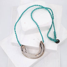 Load image into Gallery viewer, The Whitebait or Inanga Pendant is hand-crafted in solid sterling silver by NZ jeweller Vaune Mason.

