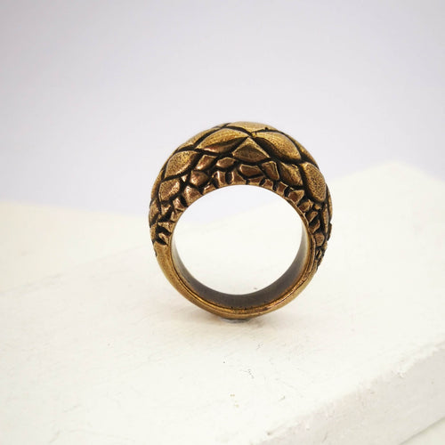 The Tuatara Ring is carved with a scale texture inspired by the skin of the endangered Tuatara. Hand crafted in NZ by The Wild Jewellery.
