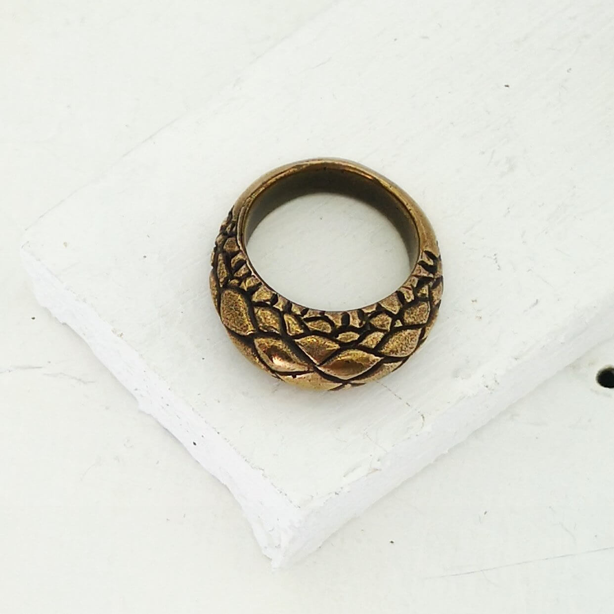 The Tuatara Ring is carved with a scale texture inspired by the skin of the endangered Tuatara. Hand crafted in NZ by The Wild Jewellery.