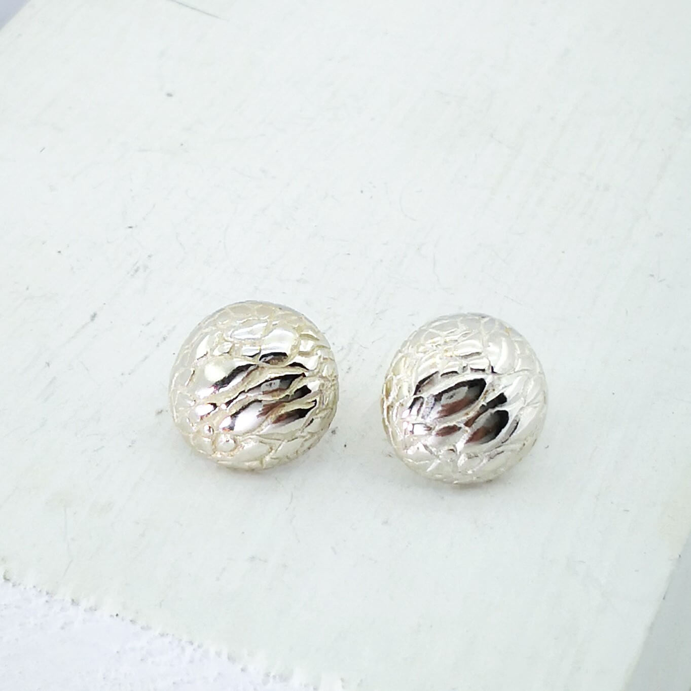 Tuatara Studs in solid sterling silver, handmade by The Wild Jewellery. These studs are inspired by the texture of the rare Tuatara, a reptile found only in NZ.