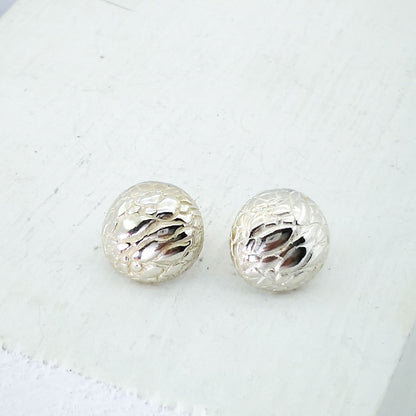 Tuatara Studs in solid sterling silver, handmade by The Wild Jewellery. These studs are inspired by the texture of the rare Tuatara, a reptile found only in NZ.