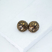 Load image into Gallery viewer, Tuatara Studs in solid bronze and sterling silver, handmade by The Wild Jewellery. These studs are inspired by the texture of the rare Tuatara, a reptile found only in NZ.
