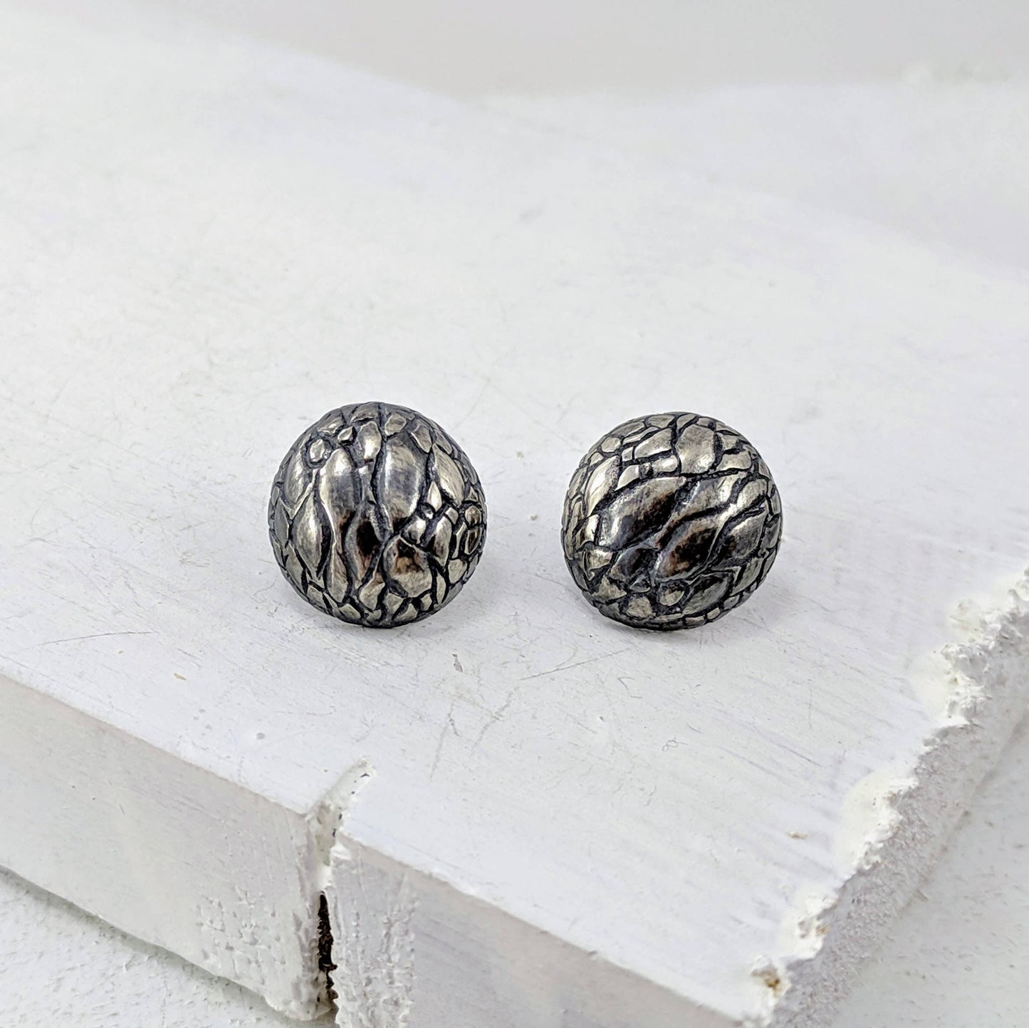 Tuatara Studs in solid sterling silver, handmade by The Wild Jewellery. These studs are inspired by the texture of the rare Tuatara, a reptile found only in NZ.