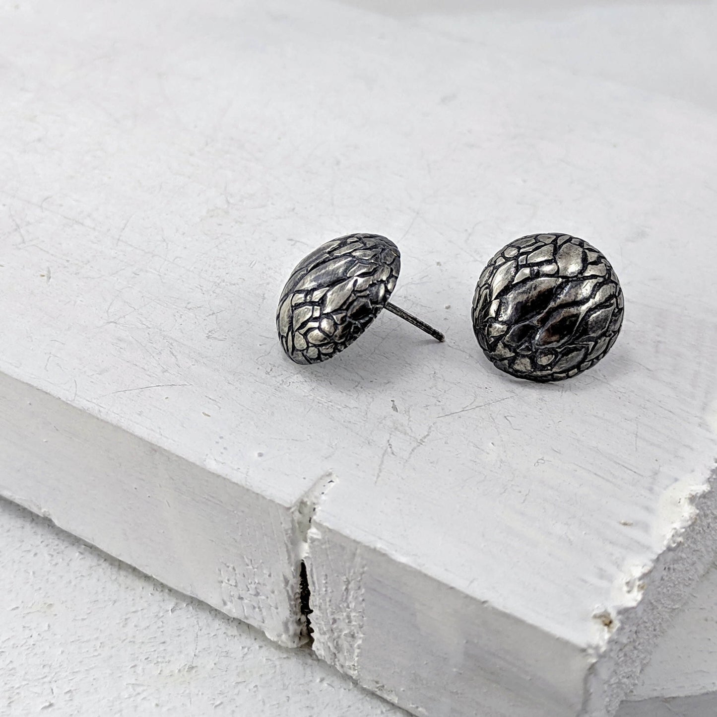 Tuatara Studs in solid sterling silver, handmade by The Wild Jewellery. These studs are inspired by the texture of the rare Tuatara, a reptile found only in NZ.