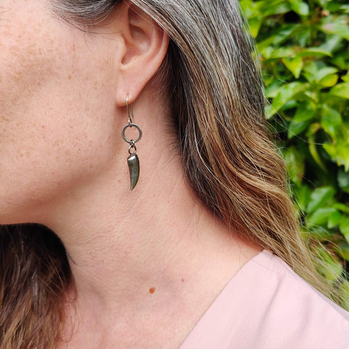 The Tusk Earrings in oxidised sterling silver, hand made NZ earrings by Buster Collins