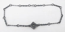 Load image into Gallery viewer, This statement necklace handcrafted by NZ jeweller Vaune Mason features hand-twisted silver chain links and a one-of-a-kind setting.
