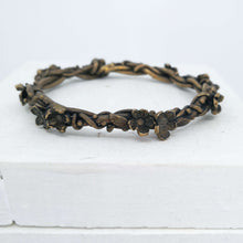 Load image into Gallery viewer, The bronze Twisting Vines bracelet by Herbert &amp; Wilks. Quality NZ jewellery available at Mason &amp; Collins.
