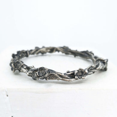 Sterling silver Twisting Vines bracelet by Herbert & Wilks. Quality NZ made contemporary jewelry available at Mason & Collins.